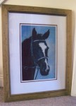 Framed pastel of a horse